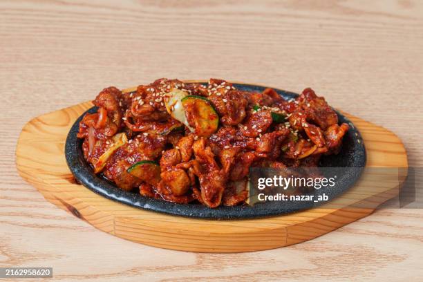 stir fried spicy pork. - korean culture stock pictures, royalty-free photos & images