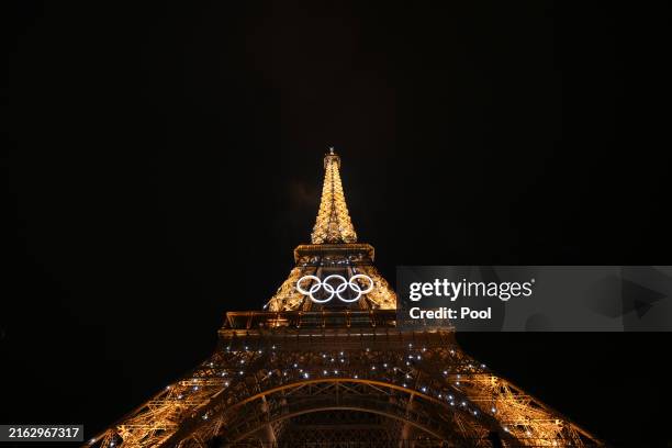 General view shows the Eiffel Tower with the Olympics Rings during the Opening Ceremony of the Olympic Games Paris 2024 on July 26, 2024 in Paris,...