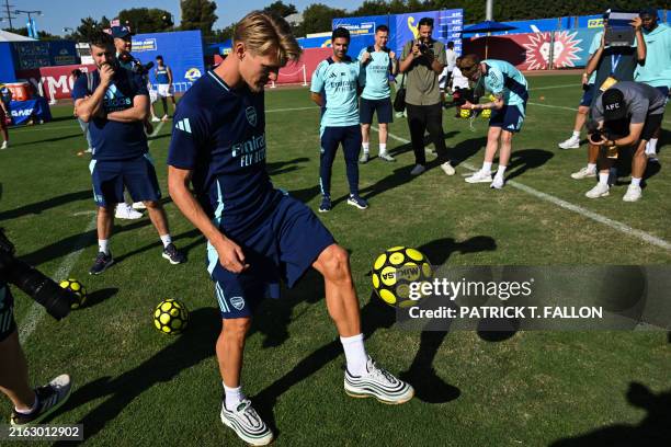 Arsenal Midfielder Martin Odegaard controls the ball during the "Football Meets Football" Youth Clinic at the LA Rams NFL training camp on the Loyola...