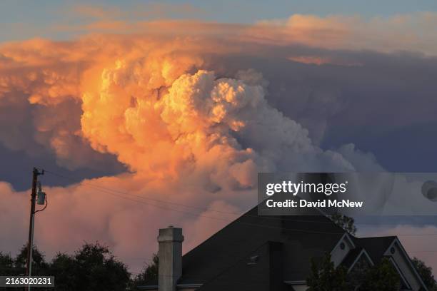 Massive pyrocumulus cloud rises from the Park Fire, which has grown to 239,152 acres and is 0 percent contained, expands at a rapid rate on July 26,...