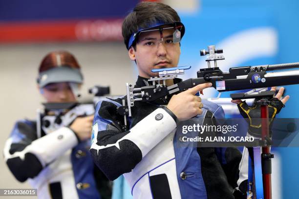 Kazakhstan's Alexandra Le and Kazakhstan's Islam Satpayev compete in the shooting 10m air rifle mixed team Bronze Medal during the Paris 2024 Olympic...
