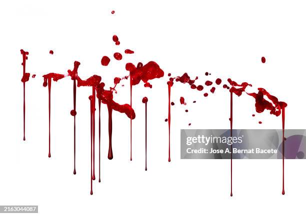 splash of a dripping drop of blood sliding on a white canvas. - heraustropfen stock-fotos und bilder