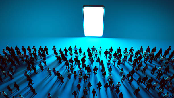 connected masses: the unstoppable attraction to screens - social media stock pictures, royalty-free photos & images