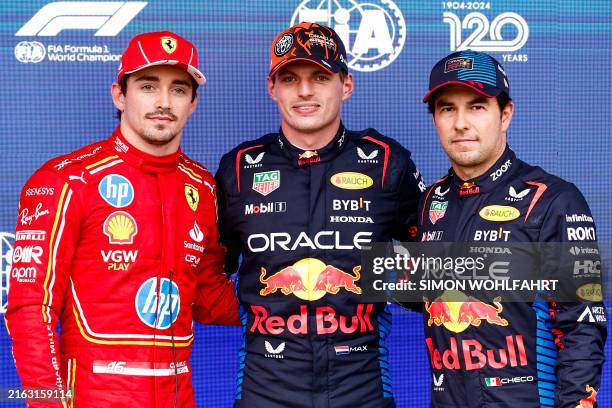 Ferrari's Monegasque driver Charles Leclerc, Red Bull Racing's Dutch driver Max Verstappen and Red Bull Racing's Mexican driver Sergio Perez pose on...
