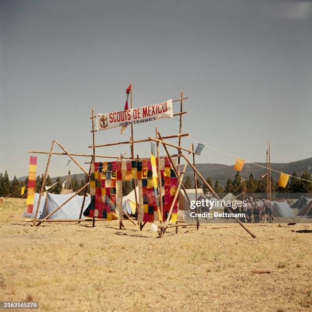 Gate decorated with colourful patches at the entrance to the Mexican scout's camp during the World Scout Jamboree in Farragut State Park, Idaho,...