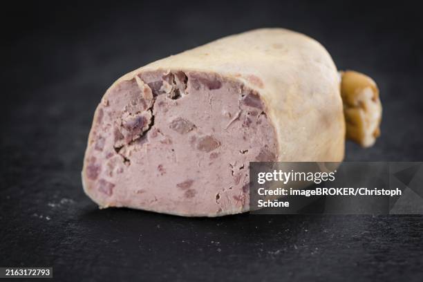 portion of german leberwurst as detailed close up shot on a slate slab (selective focus) - leberwurst stock pictures, royalty-free photos & images