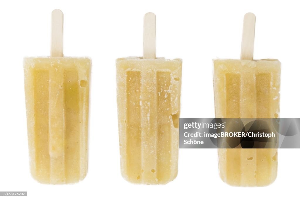 Fresh made Apple Popsicles (close-up shot) isolated on white background