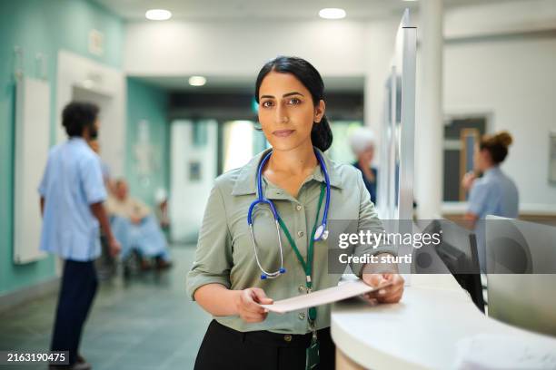 female hospital doctor portrait - medical building stock pictures, royalty-free photos & images