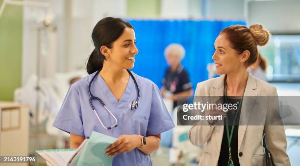 medical business relationship - medical sales representative stock pictures, royalty-free photos & images