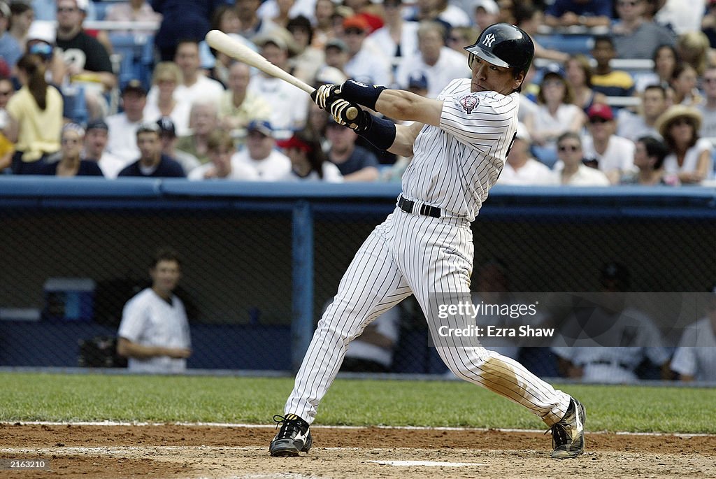 Hideki Matsui swings at a pitch