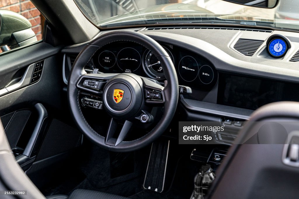 Porsche 911 Carrera cabriolet sports car dashboard