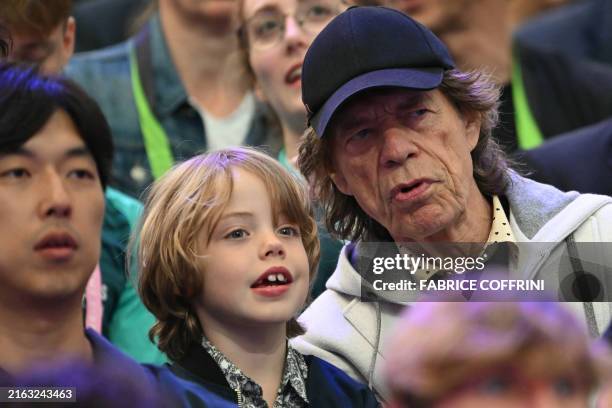 British singer Sir Mick Jagger of The Rolling Stones band and his son Deveraux Octavian Basil Jagger attend fencing competitions during the Paris...