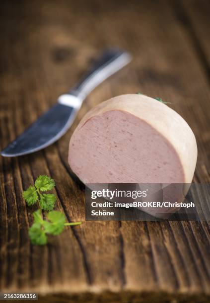 german leberwurst on an old wooden table as detailed close-up shot (selective focus) - leberwurst stock pictures, royalty-free photos & images