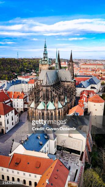 aerial view of prague old town with st. vitus cathedral and prague castle at sunrise and sunset - prague stock pictures, royalty-free photos & images