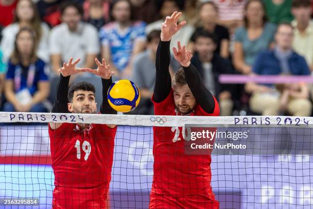 Marcin Janusz, Mateusz Bieniek are playing during Volleyball Men's Preliminary Round - Group B - match between Poland and Egypt on Day -1 Olympic...