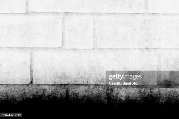 horizontal rough smudged grey or gray colored plastered whitewashed brick wall textured grunge vector backgrounds that is blank empty and partitioned divided in blocks and has dark black grungy dirty messy bottom edge border - cinder block wall stock illustrations