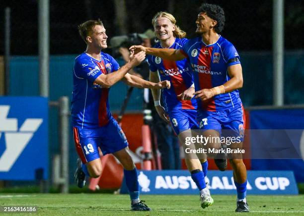 Nathan Grimaldi of the Jets celebrates after scoring his teams third goal during the Australia Cup Play-Off match between Brisbane Roar and Perth...