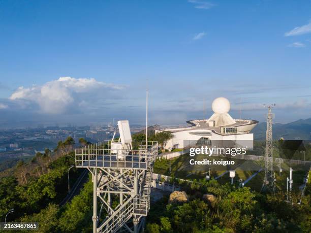 dual polarization doppler weather radar in sea of clouds at sunrise - weather radar stock pictures, royalty-free photos & images