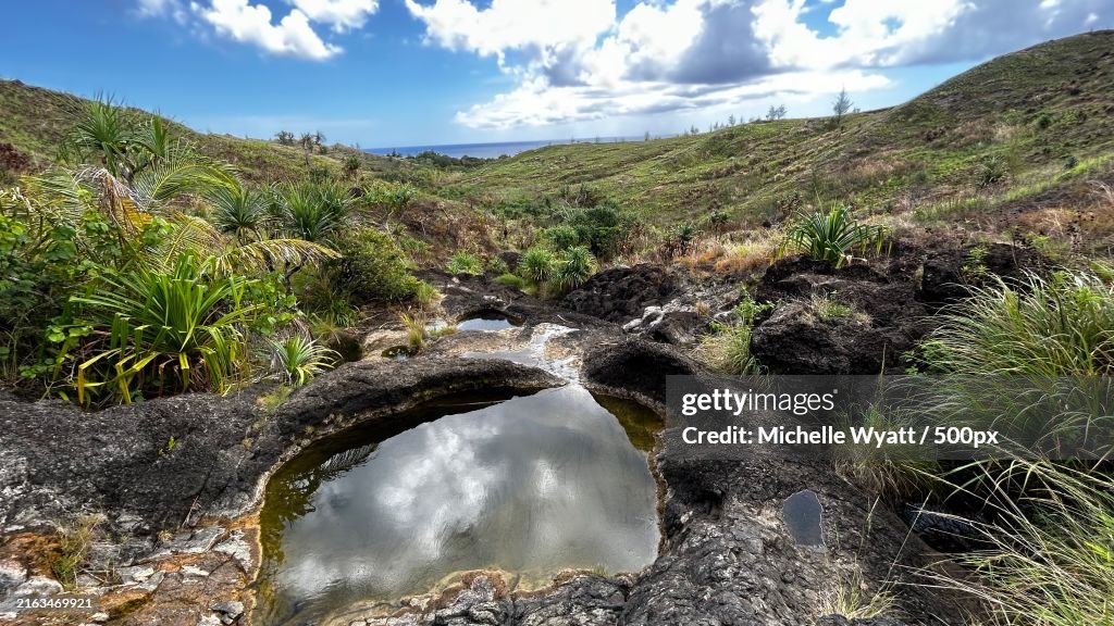 Scenic view of river amidst trees against sky,Merizo,Guam