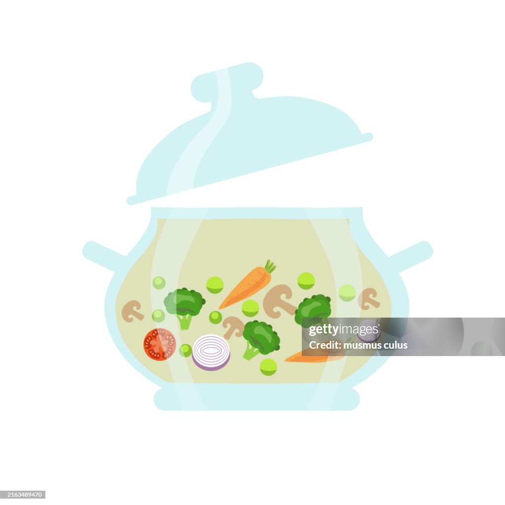 Vegan cooking soup consisting of broccoli and other vegetables in a pot