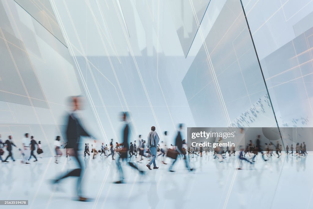 Business people walking in futuristic VR office building