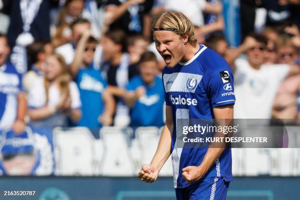 Gent's Icelandic forward Andri Gudjohnsen celebrates after scoring the first goal of his team during a football match between KV Kortrijk and KAA...