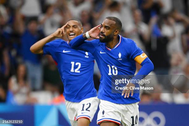 Alexandre Lacazette of Team France celebrates scoring his team's first goal during the Men's group A match between France and United States during...
