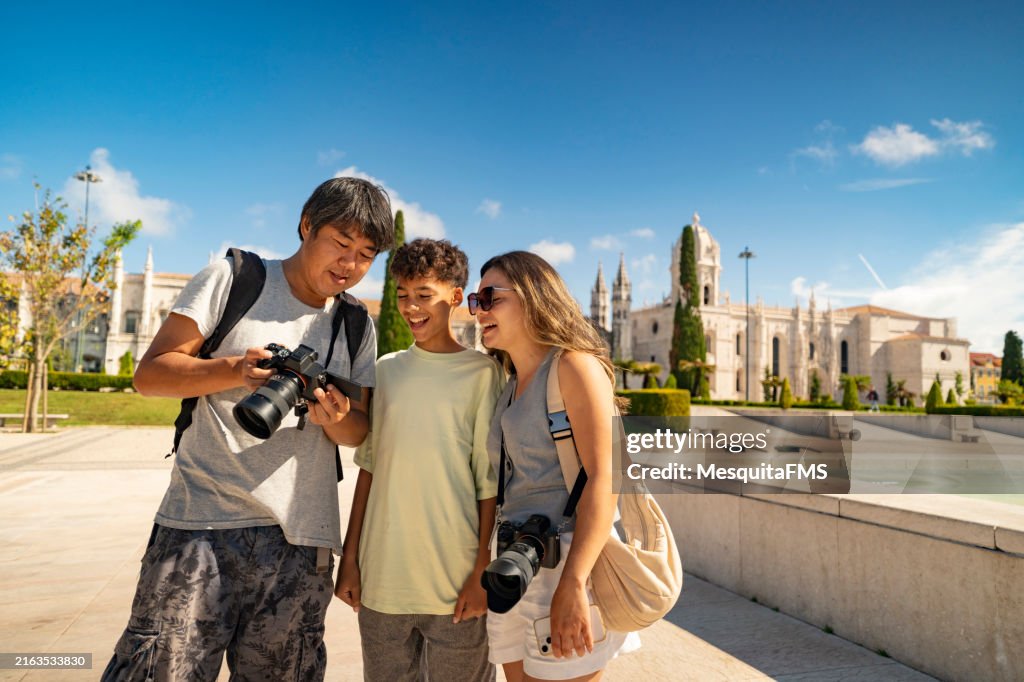 Photographer taking pictures of tourists