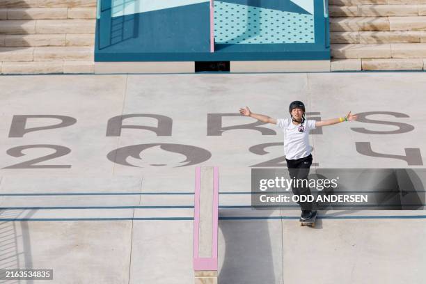 Japan's Coco Yoshizawa reacts as she competes in the women's street skateboarding final during the Paris 2024 Olympic Games at La Concorde in Paris...
