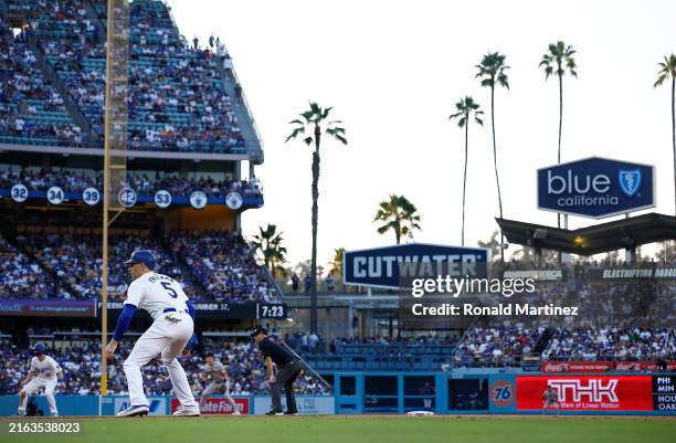 Freddie Freeman of the Los Angeles Dodgers leads off first base against the San Francisco Giants in the first inning at Dodger Stadium on July 24,...