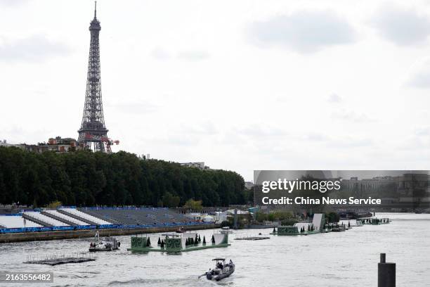 Boats and cast members rehearse on the Seine River for the opening ceremony of Paris 2024 Olympic Games on July 24, 2024 in Paris, France.