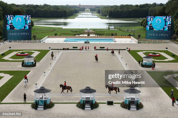 General view as riders and horses of Team Canada practice dressage during an Equestrian Eventing training session ahead of the Paris 2024 Olympics...
