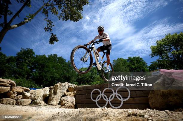 Julian Schelb of Team Germany rides the course during a Mountain Bike training session on Day-1 of the Olympic Games Paris 2024 at Elancourt Hill on...