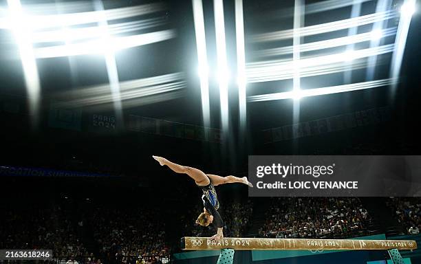 Brazil's Flavia Saraiva competes in the balance beam event of the artistic gymnastics women's qualification during the Paris 2024 Olympic Games at...