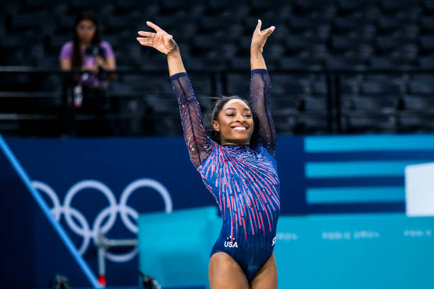 Simone Biles of Team United States smiles during a Gymnastics training session ahead of the Paris 2024 Olympics Games on July 25, 2024 in Paris,...