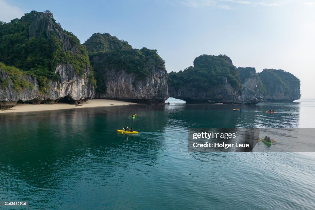 Aerial of sea kayaking excursion for passengers of boutique cruise ship Ylang (Heritage Line)