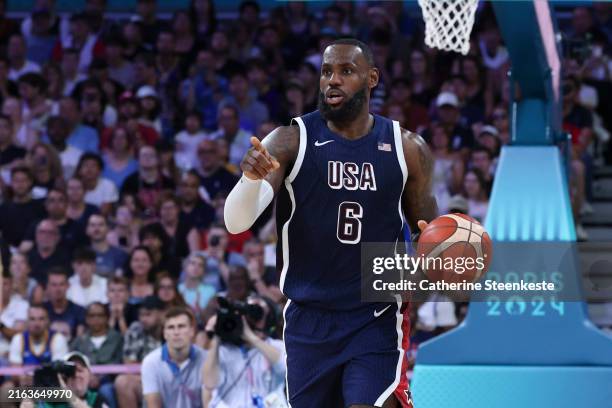 LeBron James of Team USA dribbles the ball during the Men's Group Phase - Group C match between Serbia and USA on Day 2 of the Olympic Games Paris...
