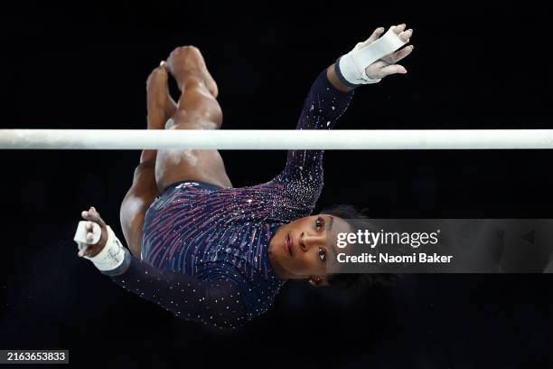 Simone Biles of Team United States practices on the uneven bars during a Gymnastics training session in the Bercy Arena ahead of the Paris 2024...