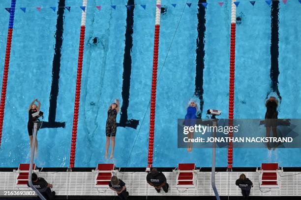 An overview shows Hong Kong's Cheung Sum Yuet Cindy, Kazakhstan's Xeniya Ignatova, Israel's Aviv Barzelay and Trinidad and Tobago's Zuri Ferguson as...