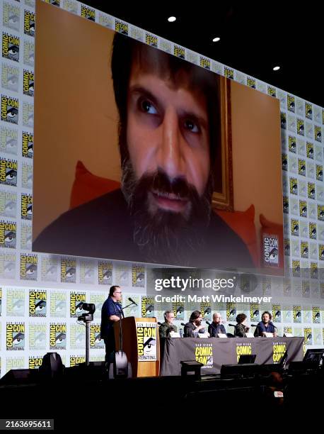 Eric Goldman, Paul Simms, Matt Berry, Mark Proksch, Kristen Schaal, and Kyle Newacheck with Kayvan Novak speak onstage during the "What We Do In The...