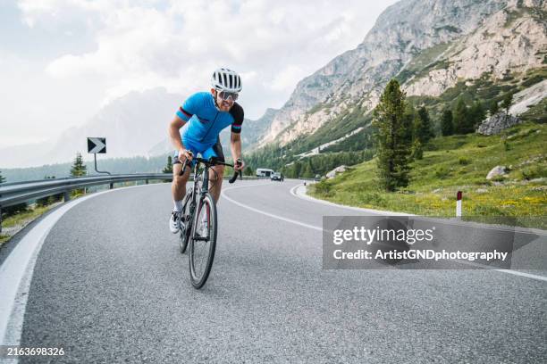 cycling is not only a hobby but a lifestyle. - ciclista foto e immagini stock
