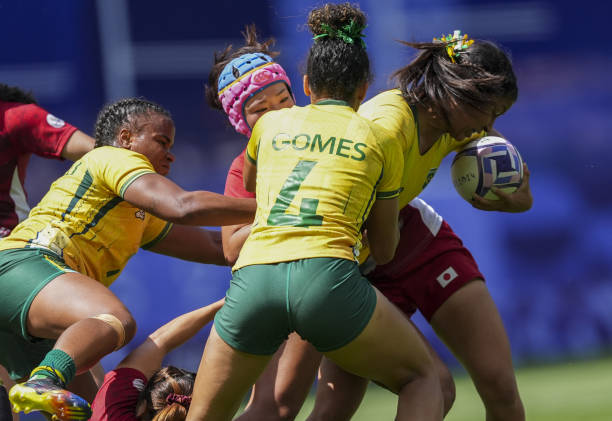 Players compete during the women's pool B rugby sevens match between Japan and Brazil during the Paris 2024 Olympic Games at the Stade de France in...