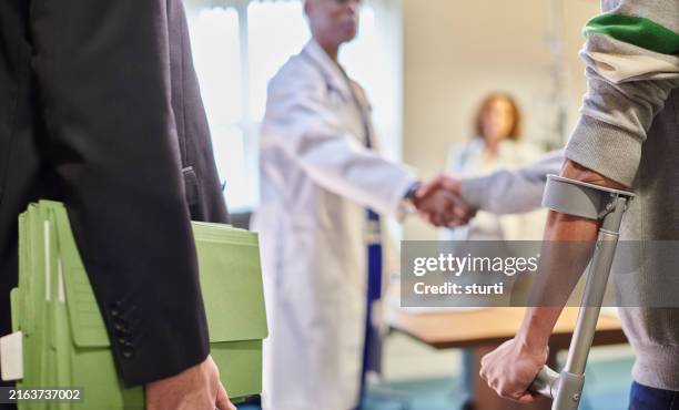 medical negligence hearing - physical injury stock pictures, royalty-free photos & images