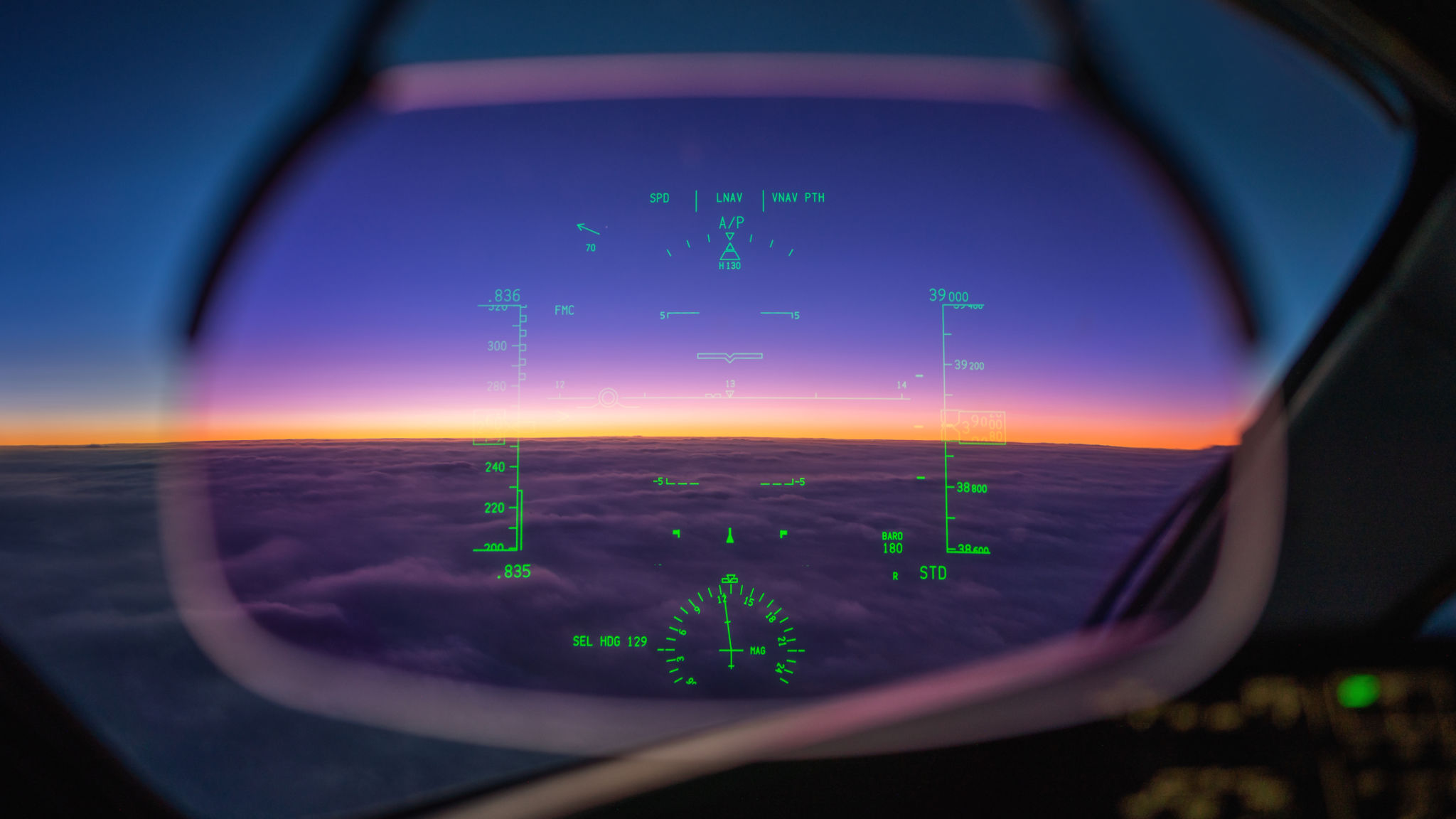 Boeing 787 Cockpit Window View At Sunrise Above The Clouds Boeing 787 Cockpit Window View At Sunrise Above The Clouds