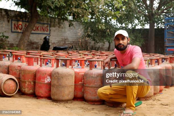 worker portrait at lpg gas cylinder factory! - lpg home stock pictures, royalty-free photos & images