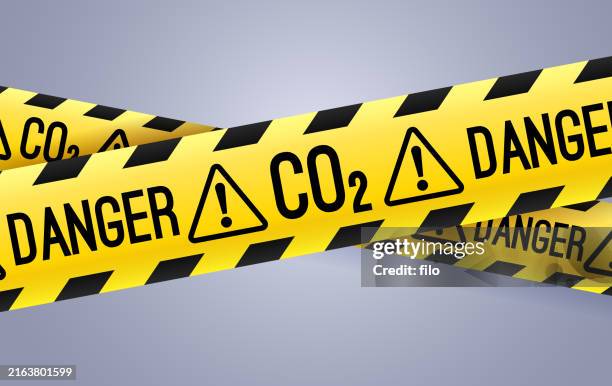 danger co2 carbon dioxide global warming climate change caution warning barrier tape - accidental death stock illustrations