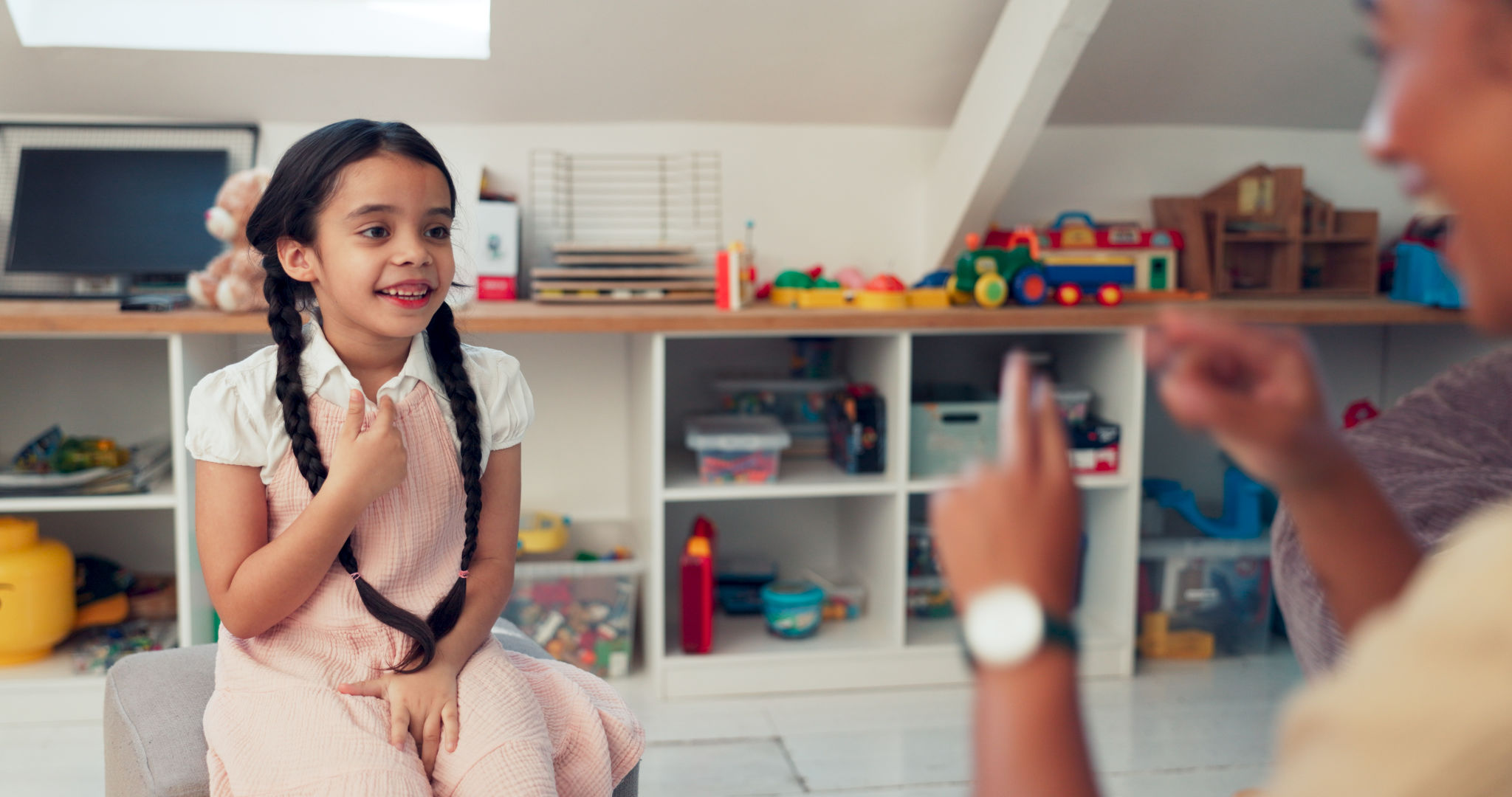 Girl, kid and sign for speech therapy, communication and verbal practice for phonological disorder. Woman, child and happy for technique or skill for vocal development, activity and exercise. Girl, kid and sign for speech therapy, communication and verbal practice for phonological disorder. Woman, child and happy for technique or skill for vocal development, activity and exercise.