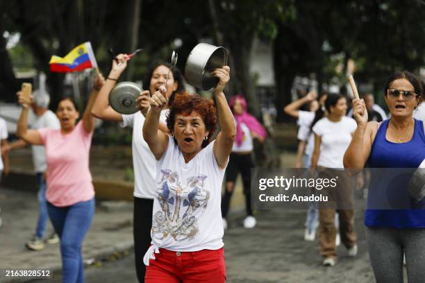 People gather to protest against reelection of Venezuelan President Nicolas Maduro for the 3rd term one day after the Venezuelan presidential...