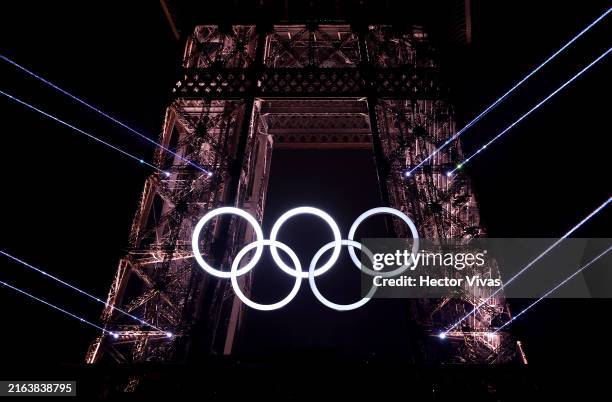 Light Show takes place as The Olympic Rings on the Eiffel Tower are illuminated during the opening ceremony of the Olympic Games Paris 2024 at Place...