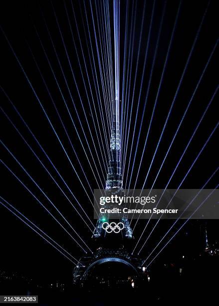 Light Show takes place as The Olympic Rings on the Eiffel Tower are illuminated during the opening ceremony of the Olympic Games Paris 2024 at Place...